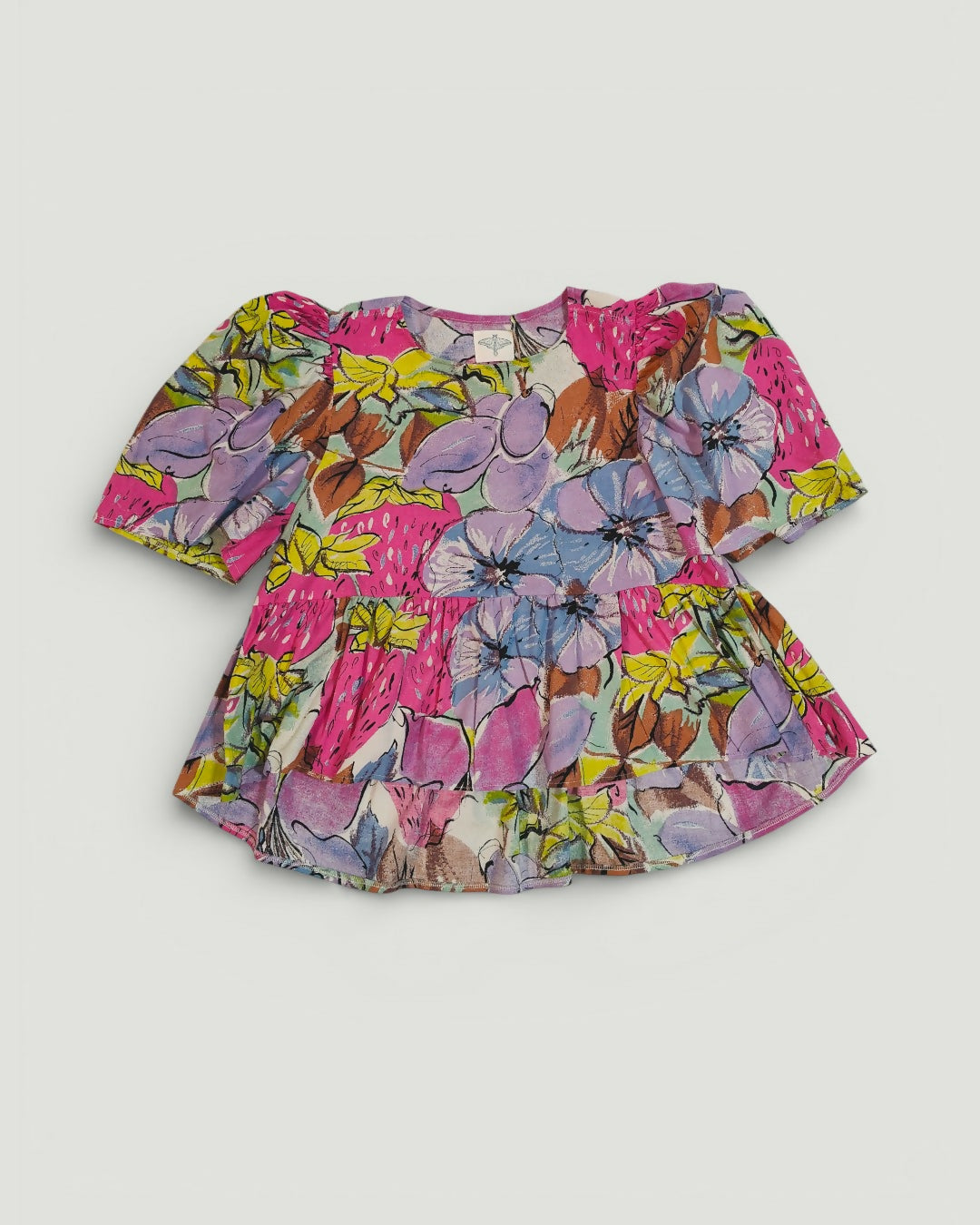 Bufiasta bluzka z przedłużanym tyłem